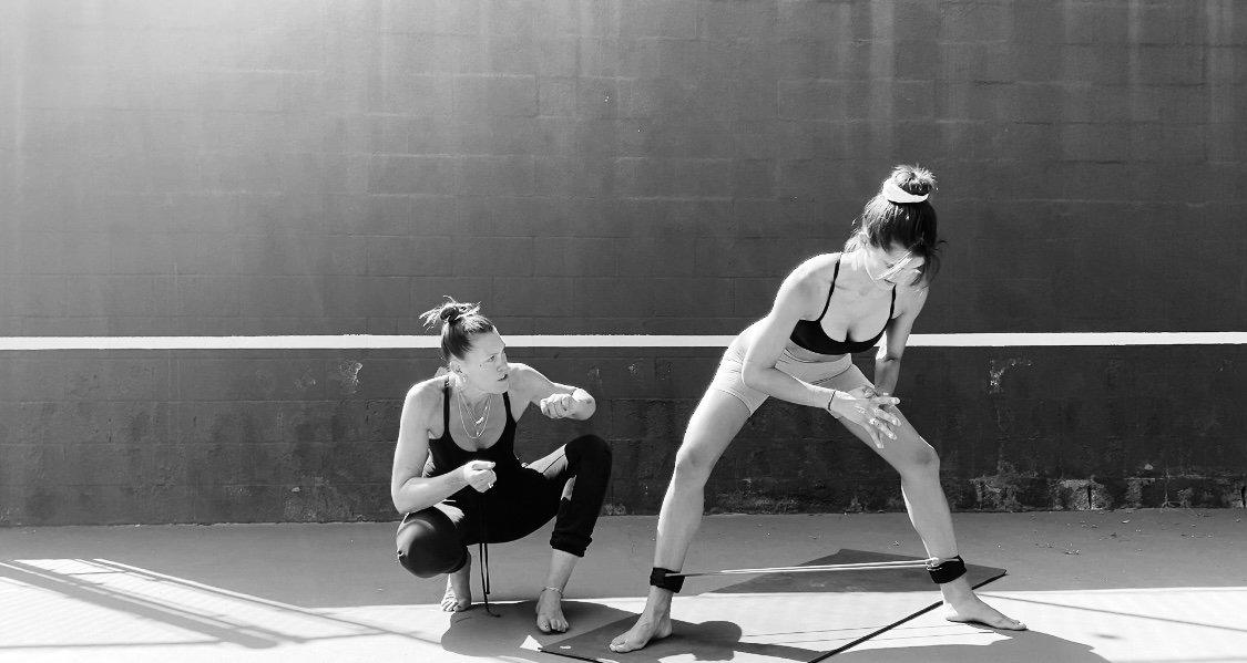 Sam coaching a resistance band session