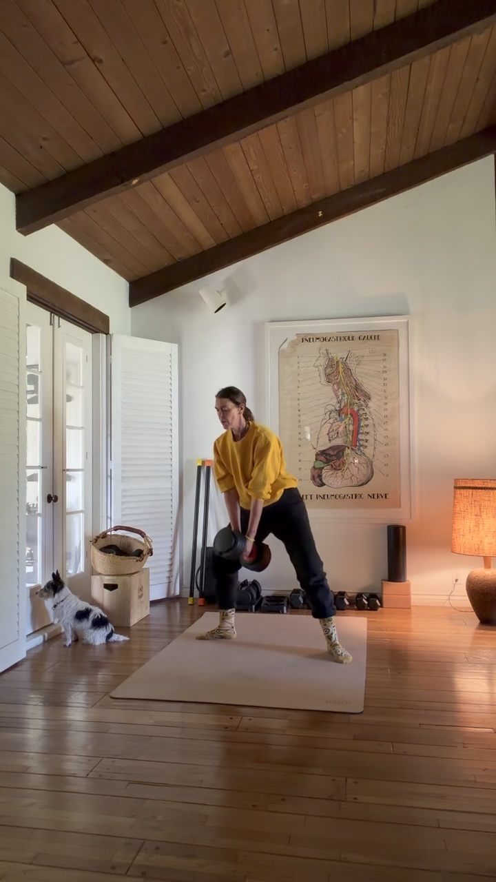 Sam training with dumbbells at home